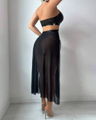 Black sheer long skirt dress with cropped bra top, open back