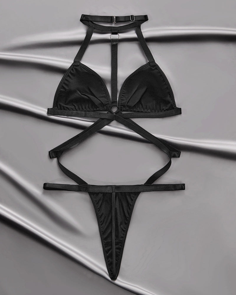 Black leather halter-neck triangle bra and thong with adjustable cross straps