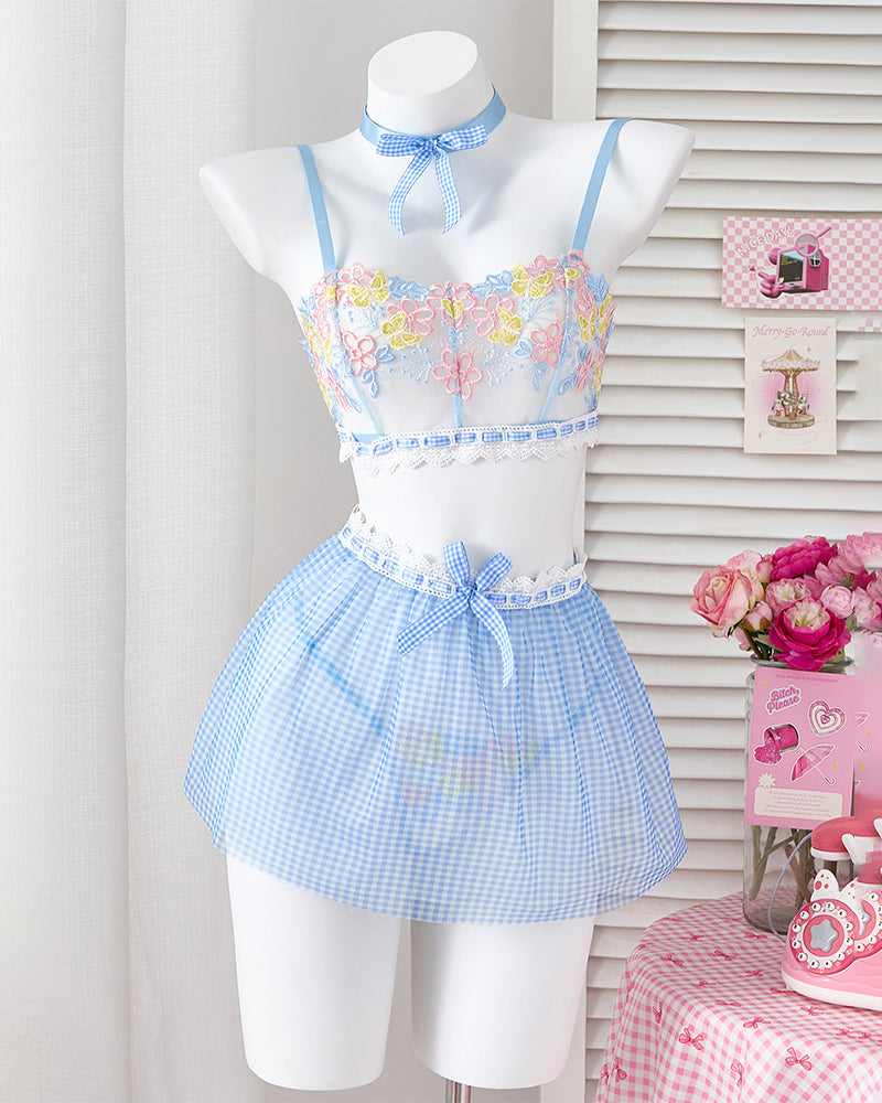 Light blue lace mesh bralette and plaid mini skirt set on white mannequin