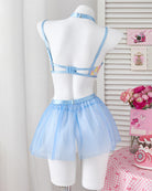 Light blue lace mesh bralette with back straps and plaid mini skirt on mannequin