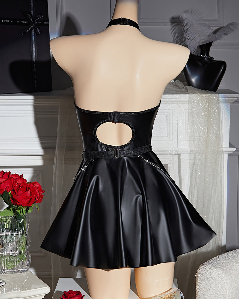 Black leather halter mini dress back on mannequin with cutout, buckled strap, flared skirt