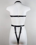 Black PU leather full-body harness belt with back straps and thigh garters