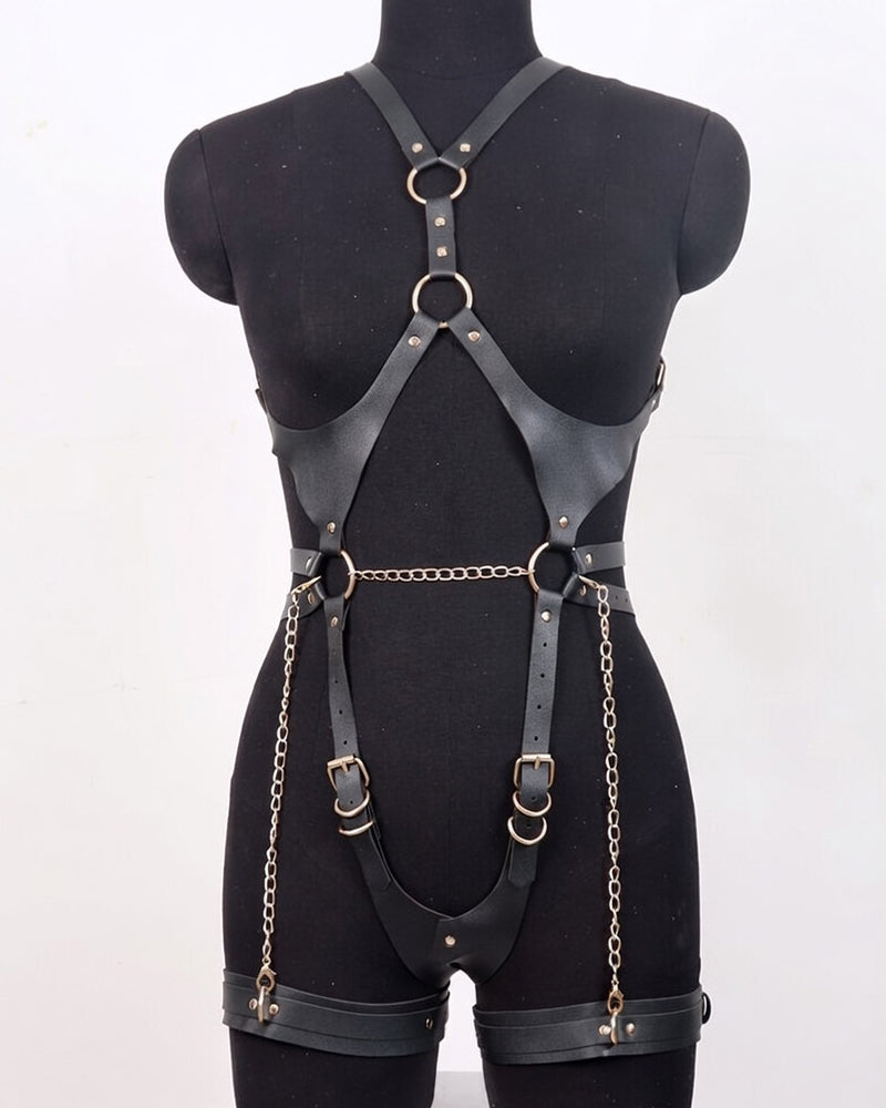 Black faux leather full-body harness with crossed shoulder straps and chain waist ties