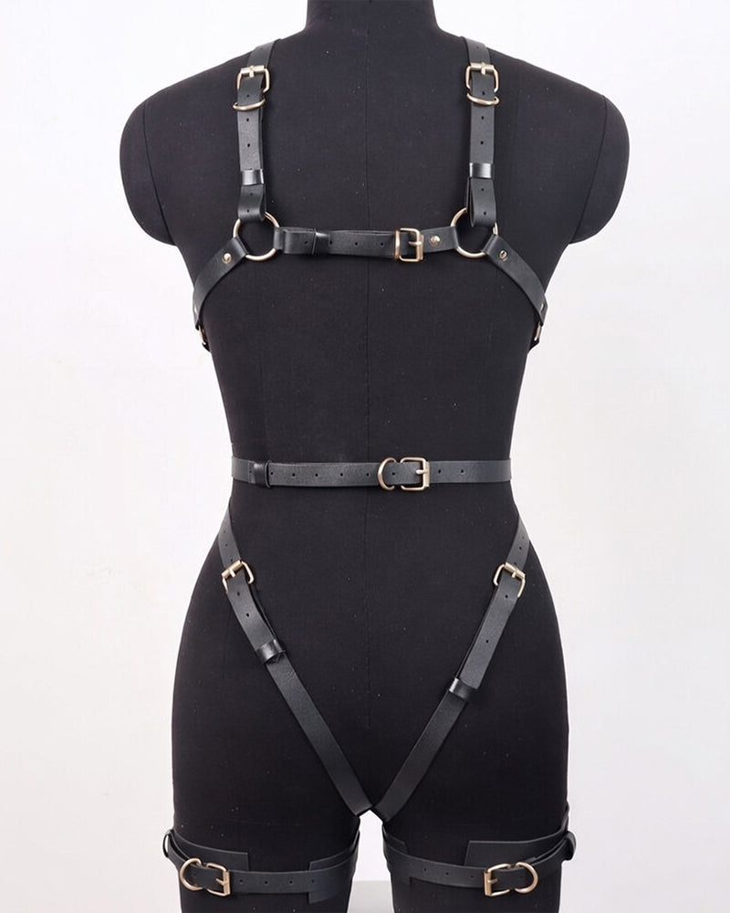 Black faux leather full-body harness with wide chest band, hip straps, and leg cuffs