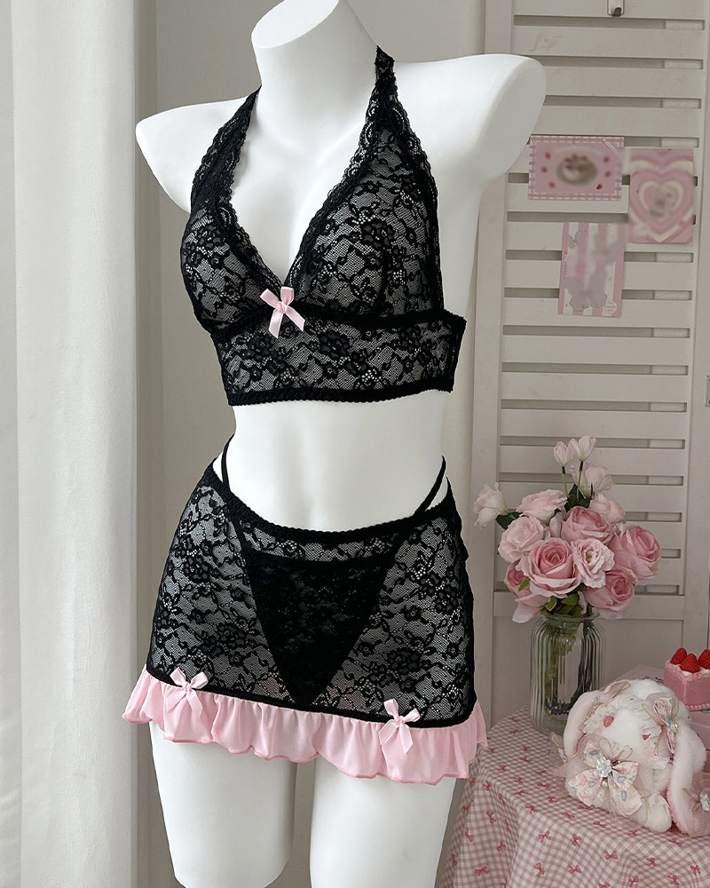 Black lace halter bra and mini skirt set on mannequin with pink ruffle trim