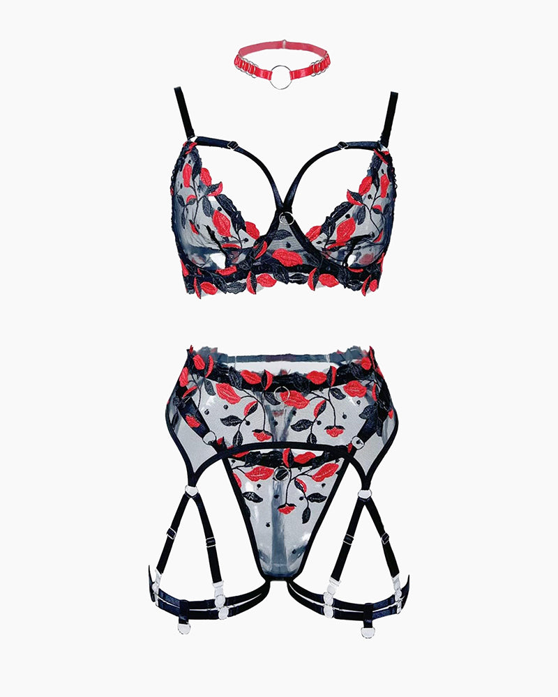 Black sheer lingerie set with red floral bra and matching garter belt with straps