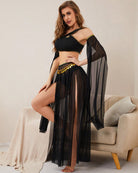 Black asymmetrical crop top and mesh maxi slit skirt set, gold trim waist detail