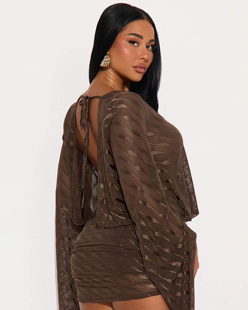 Brown backless mini dress with knotted shoulder ties, long flared sleeves, wavy texture