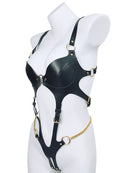 Black leather harness bodysuit with side and leg straps, gold chain across waist