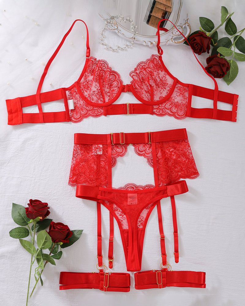 Red lace lingerie set with underwire bra, garter skirt, thong, and suspender straps