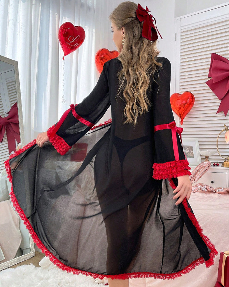 Black sheer mesh long robe, back view, red lace hem and bow ties