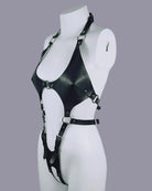 Black leather bondage harness bodysuit with side strap layout and front cutout