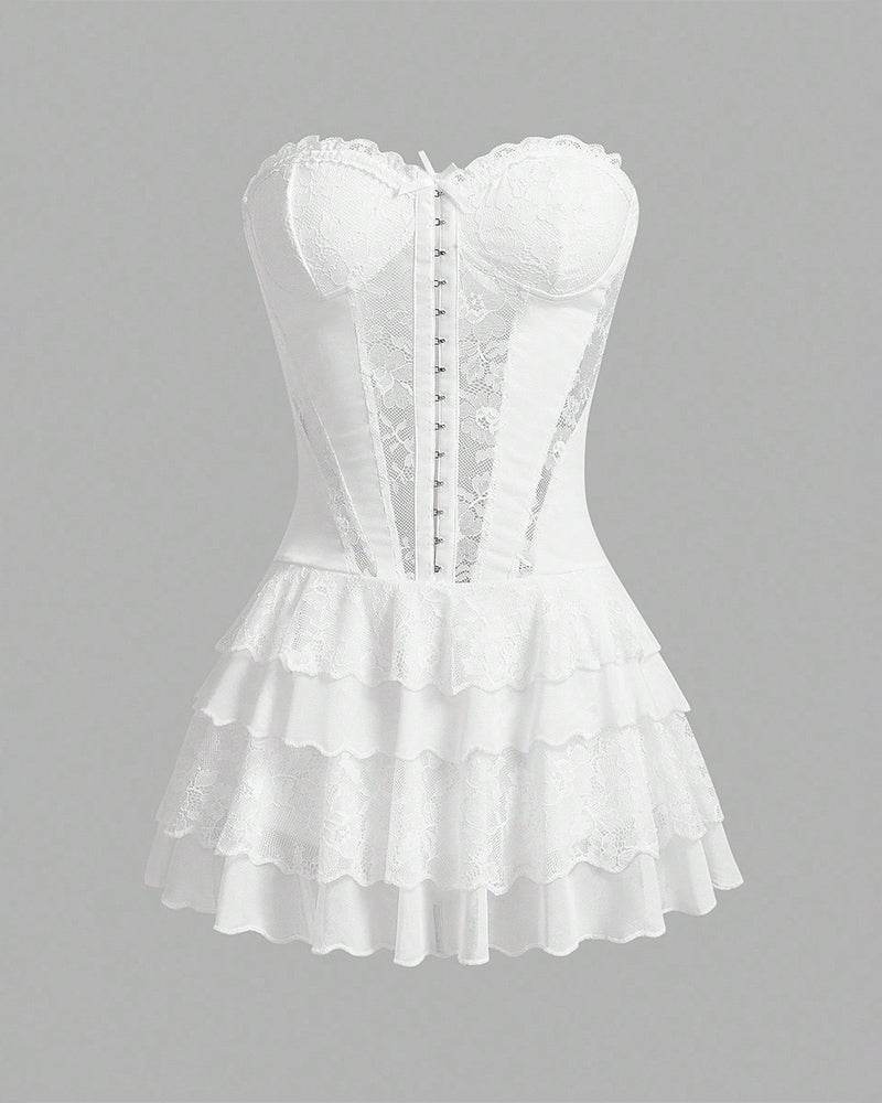 White lace corset tutu dress with sweetheart bust and tiered ruffle skirt