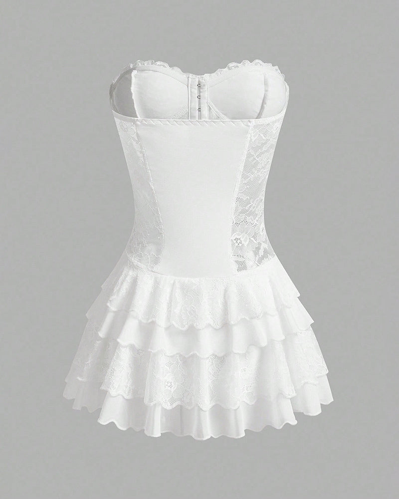 White lace corset tutu dress with structured bodice and tiered ruffle skirt