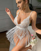 White lace babydoll lingerie with scalloped cups and long fringe hem