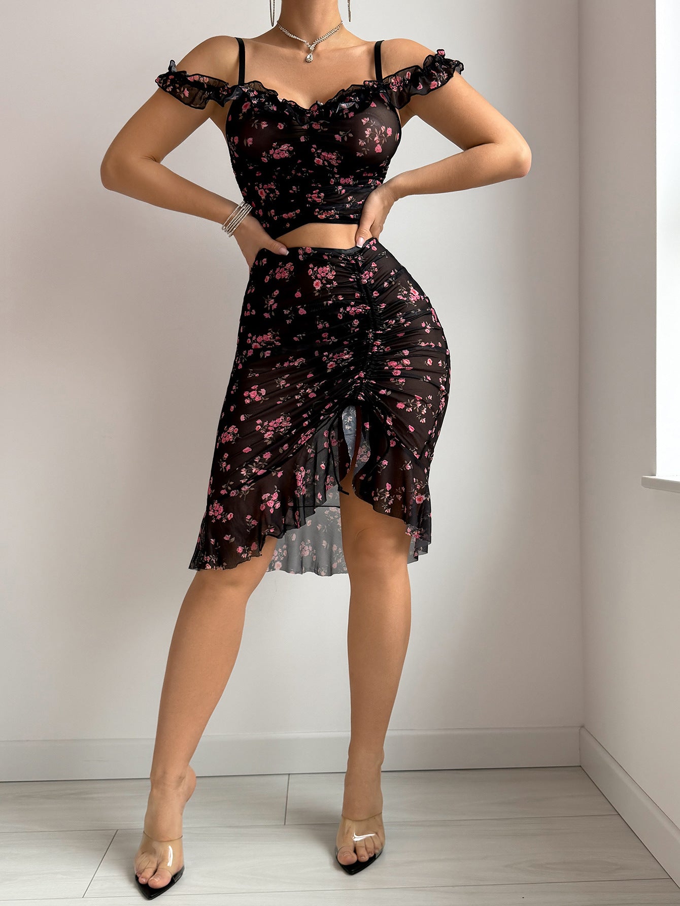 Black floral mesh ruched two-piece set with off-shoulder ruffles and draped mini skirt