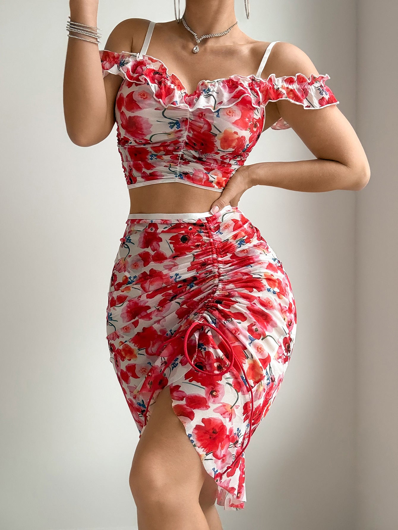 Red floral mesh ruched two-piece set with off-shoulder ruffle top and ruched mini skirt