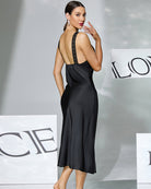 Black satin midi slip dress, open back with lace-trim straps