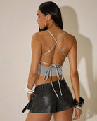Grey tie-back crop top with crisscross straps and back drawstring