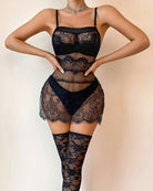 Black lace slip dress with matching stockings, front view