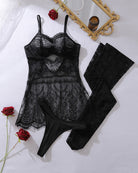 Black lace slip dress and matching stockings set, flat lay