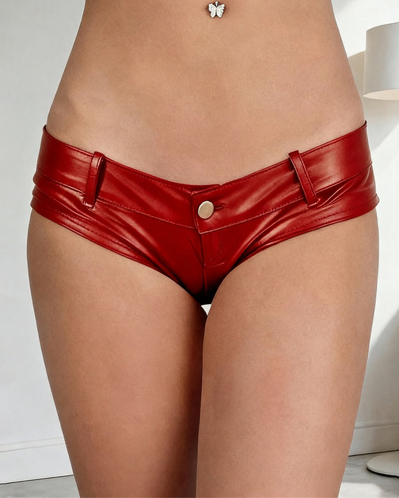 Red faux leather low-rise booty shorts with center button and wide waistband tabs
