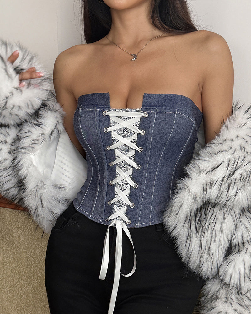 Blue denim strapless corset top with white lace-up front and corset eyelets