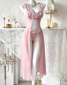 Pink satin-mesh maxi skirt set with floral lace trim and matching thong on mannequin