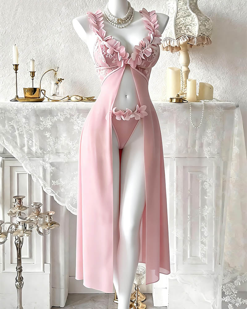 Pink satin-mesh maxi skirt set with floral lace trim and matching thong on mannequin