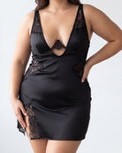 Black satin lace chemise slip dress with deep V neckline and lace side panels