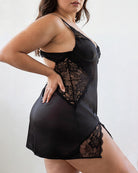 Black satin slip dress with lace overlay bodice and scalloped V-neck