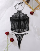 Black sheer lace corset and thong set, halter ties, laid flat
