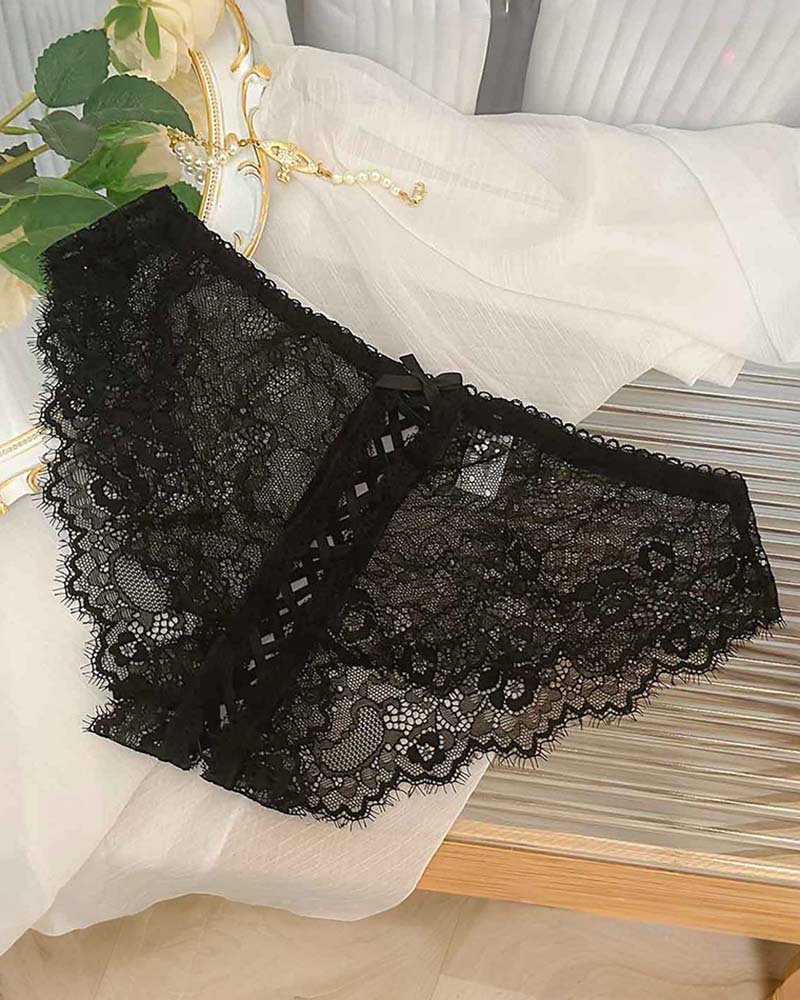 Black lace crisscross brief panties with lace-up front and scalloped trim
