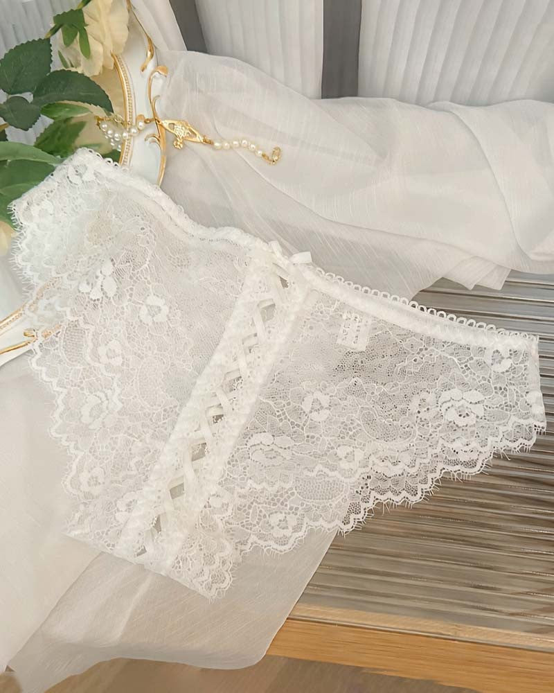 White lace crisscross brief panties with lace-up front and scalloped trim