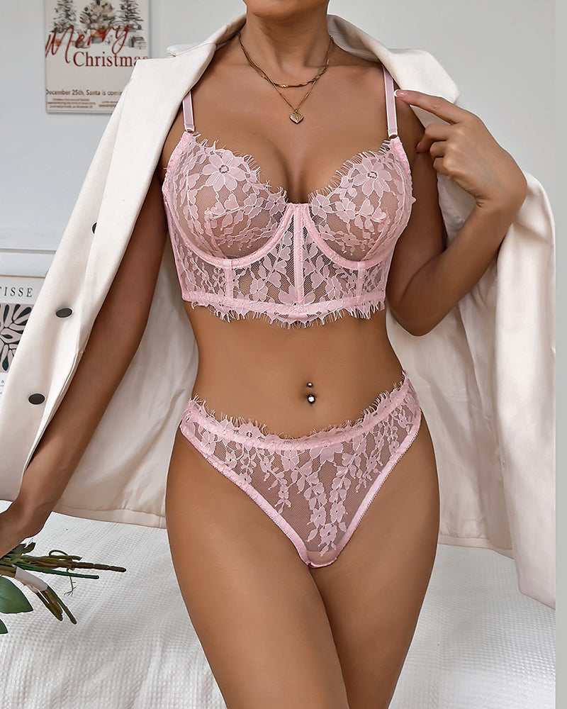 Pink floral lace bralette and matching panties with scalloped edges