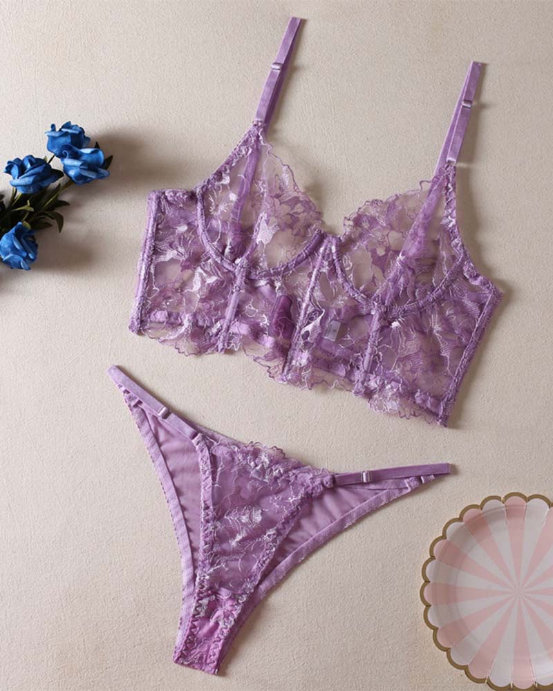 Lavender lace bralette and thong-style panty set, laid flat