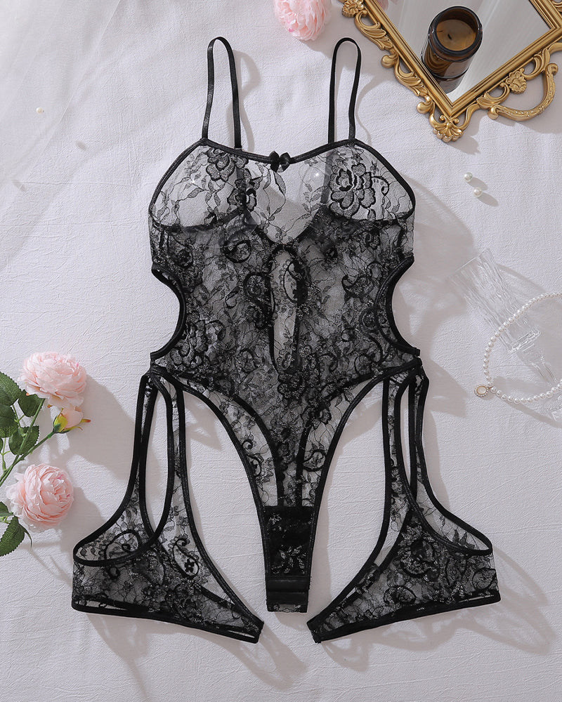 Black sheer lace cut-out teddy with adjustable straps and bow-tie details.