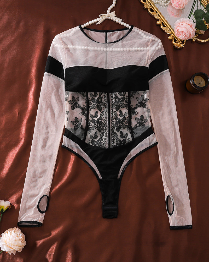 Sheer mesh bodysuit with lace front panel, black waist and thigh accents, long sleeves