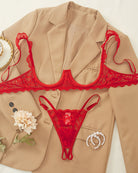 Red lace cupless bra and crotchless thong set with scalloped trim and straps