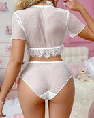 White polka-dot sheer mesh crop top and panties with lace waistband and bow ties