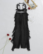 Black sheer bralette and flowing mesh pants with ruffle trim, lingerie set