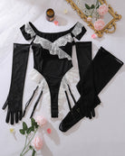 Flat lay black maid bodysuit with lace trim, sheer gloves, and garter stockings set