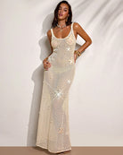 Beige sheer crochet maxi dress with spaghetti straps, sequined texture and fitted waist