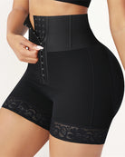 Black high-waisted shapewear shorts with open front panel detail, lace hem