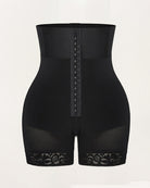 Black high-waisted shapewear shorts, front view, hook-and-eye panel and lace hem