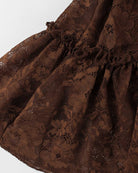 Brown lace ruffled mini dress neckline and shoulder detail