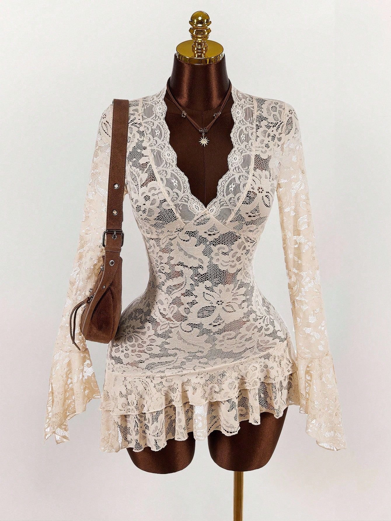 Cream lace V-neck mini dress with long sleeves and layered ruffle skirt
