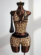 Leopard print halter crop top and high-waisted shorts set, black trim, front on mannequin