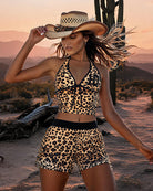 Leopard print halter crop top and high-waisted shorts set, black trim, side view
