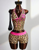 Leopard print halter crop top and high-waisted shorts set, rose pink trim, front on mannequin